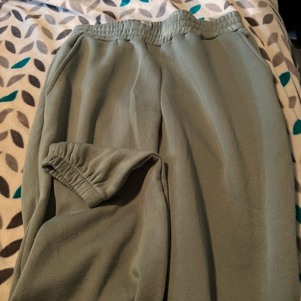 selling these soft very comfortable light green sweatpants